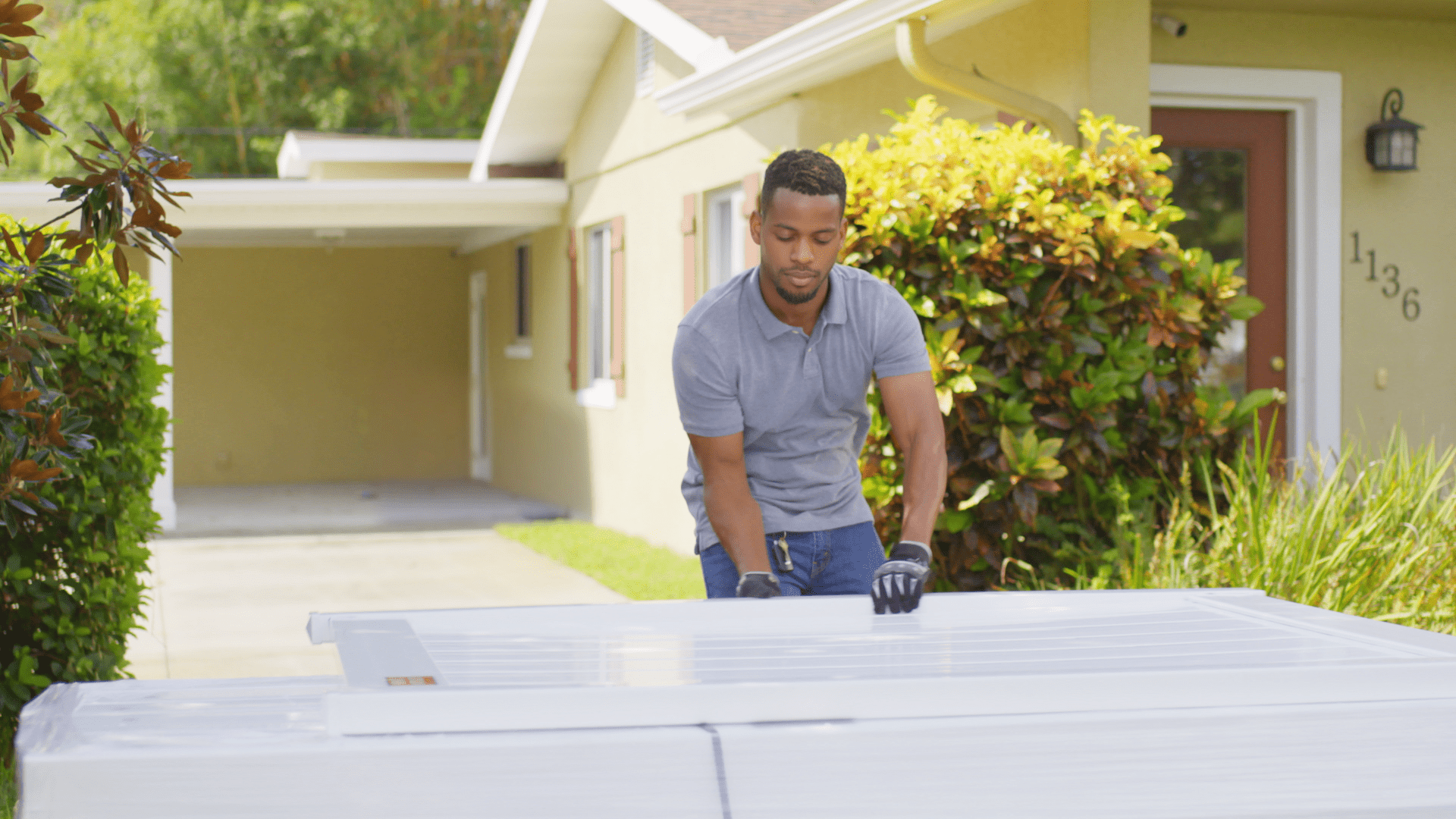 DIY vinyl Fence in a Box installation with white fence panels